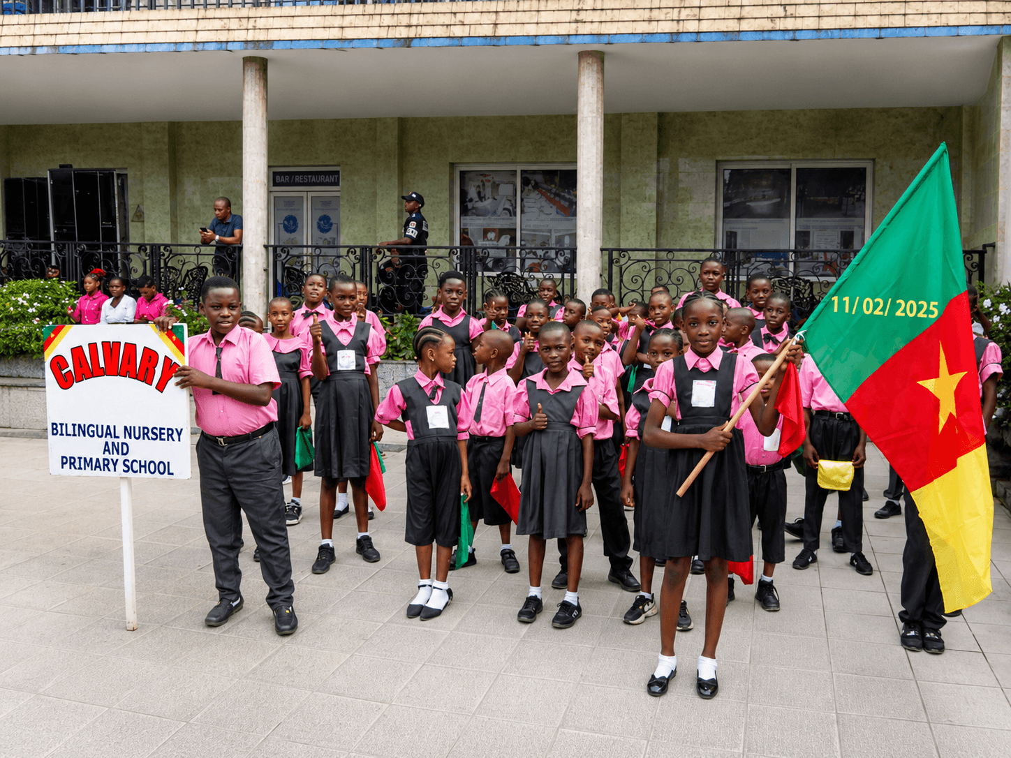Calvary students gathered for a community event carrying the Cameroon flag